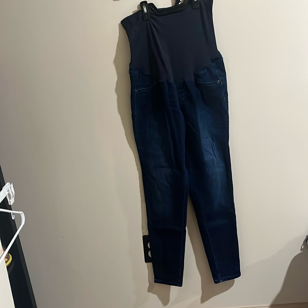 A glow, dark blue Jean jeggings size 10 with panel